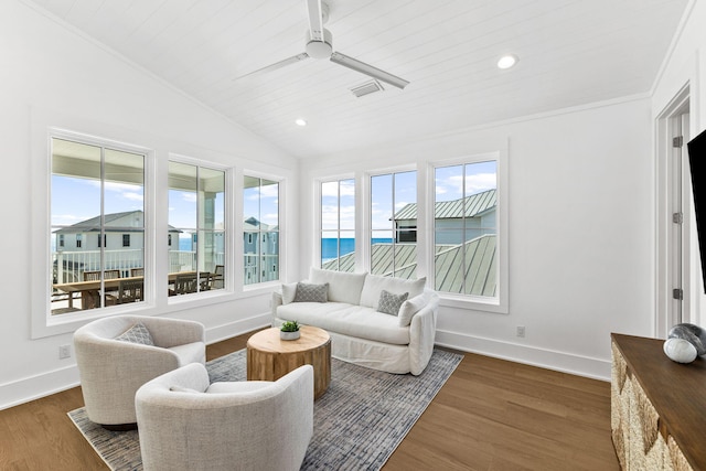 sunroom with lofted ceiling, a water view, and wooden ceiling