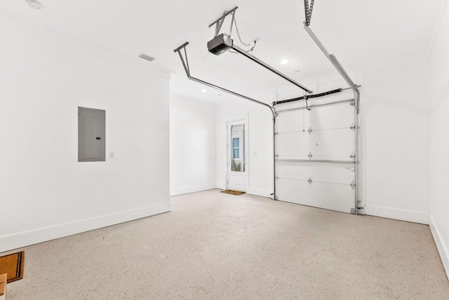 garage featuring a garage door opener and electric panel