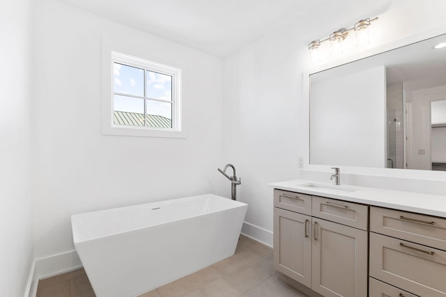 bathroom featuring vanity, tile patterned flooring, and separate shower and tub