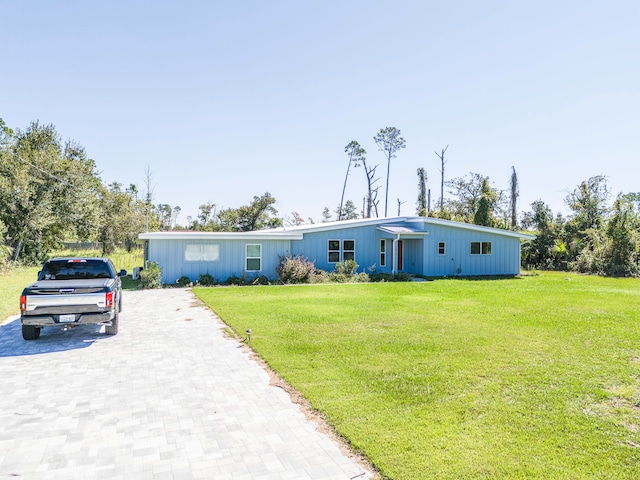 view of front of home with a front lawn