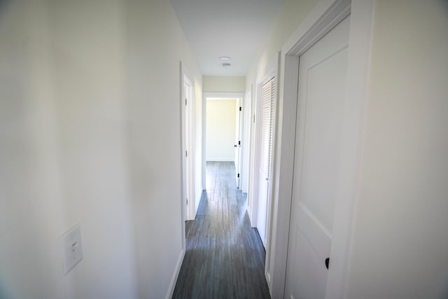 hall featuring dark hardwood / wood-style floors