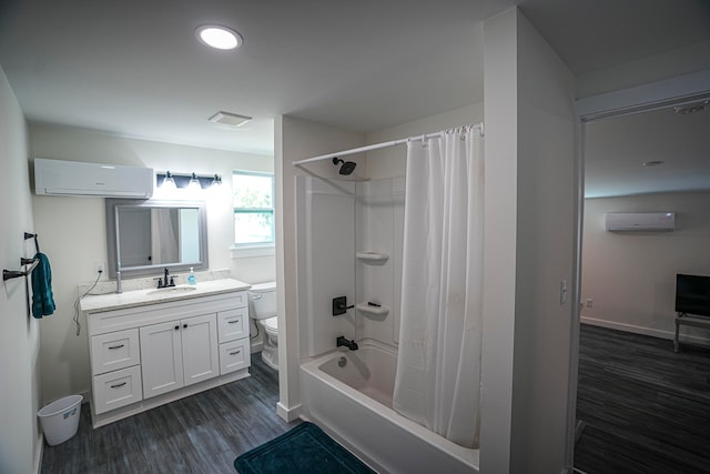 full bathroom featuring vanity, toilet, shower / bath combo, and an AC wall unit