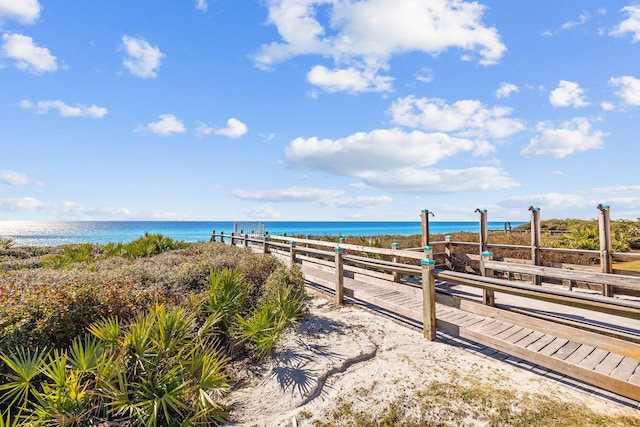 property view of water featuring a beach view