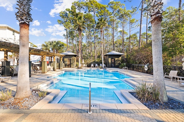 view of pool featuring a pergola and a patio