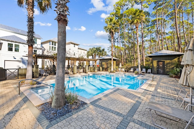 view of swimming pool featuring a gazebo and a patio area