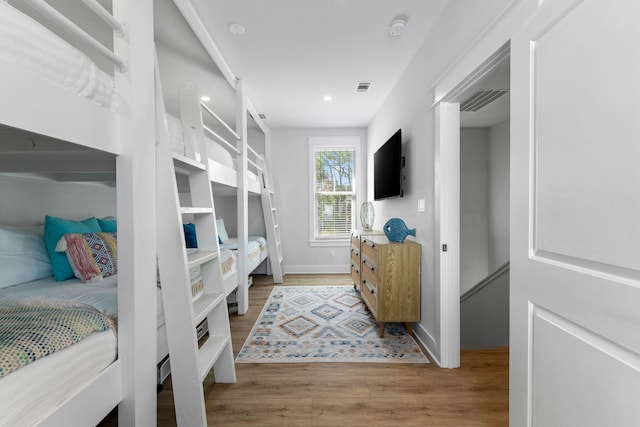 bedroom with light hardwood / wood-style floors