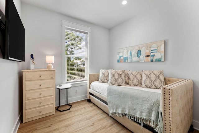 bedroom with light hardwood / wood-style flooring