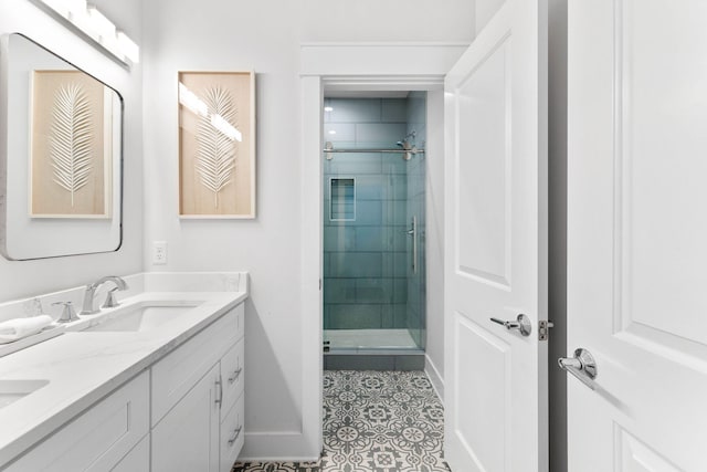 bathroom featuring vanity, tile patterned floors, and an enclosed shower