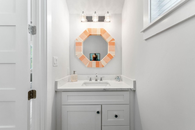 bathroom featuring vanity and plenty of natural light