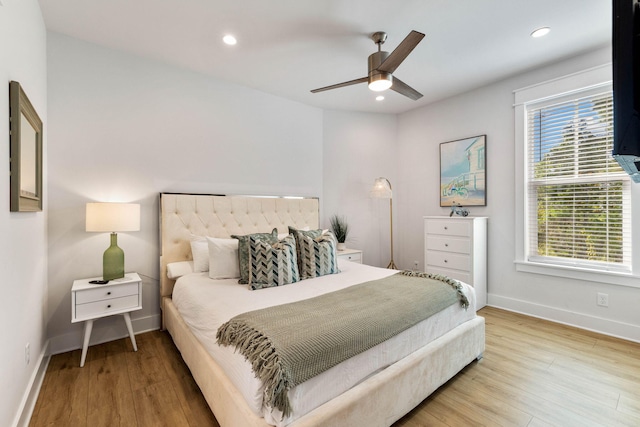 bedroom featuring wood-type flooring and ceiling fan