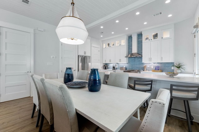 dining space featuring dark hardwood / wood-style floors