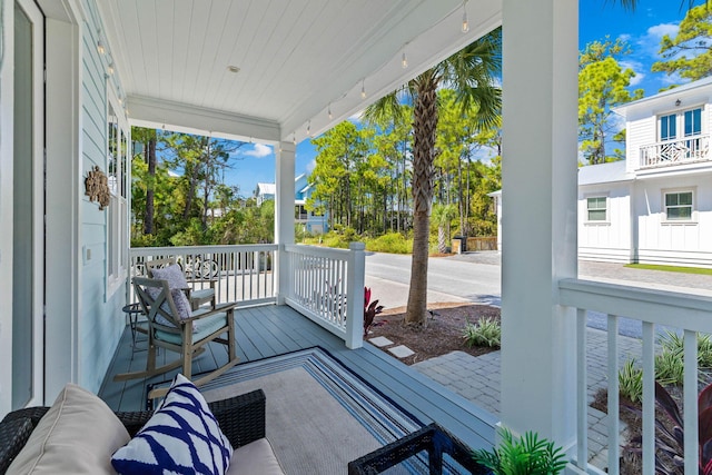 wooden terrace with covered porch