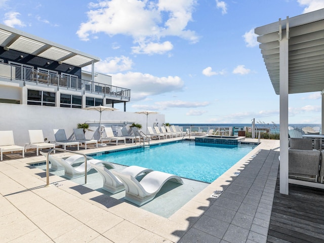 view of pool featuring a patio