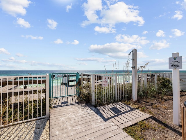 wooden deck with a water view