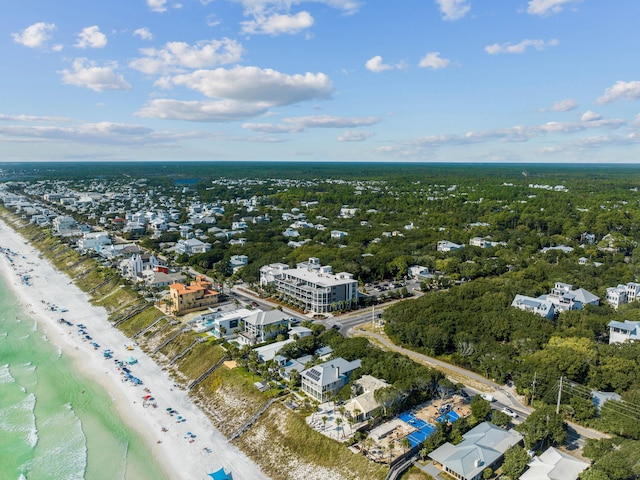 birds eye view of property featuring a view of the beach and a water view