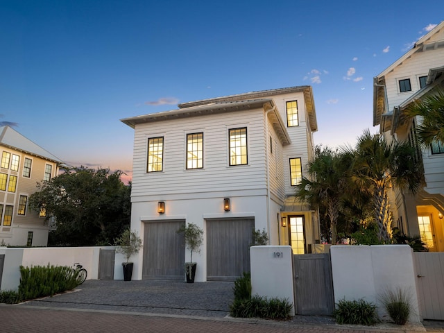 view of front of home with a garage