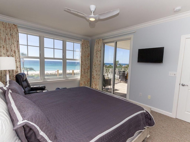 carpeted bedroom featuring access to outside, ornamental molding, and ceiling fan