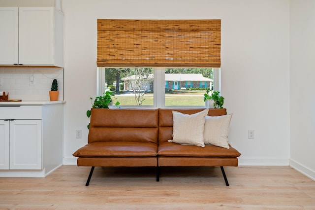 living room with light hardwood / wood-style floors