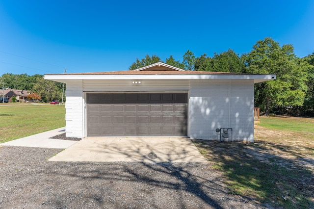 garage with a lawn