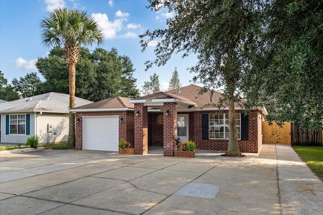 ranch-style home featuring a garage