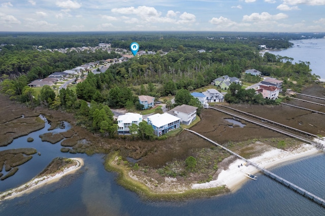 drone / aerial view with a water view