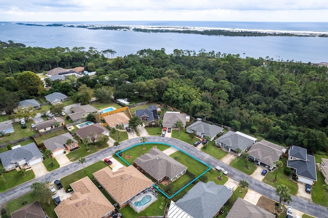 bird's eye view with a water view