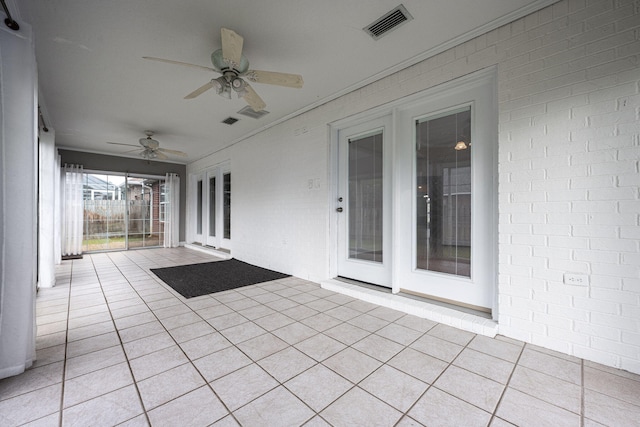 view of patio with ceiling fan