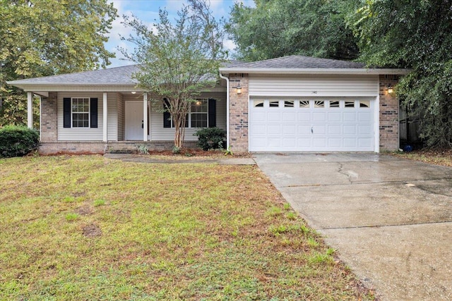 ranch-style home featuring a front lawn, covered porch, and a garage