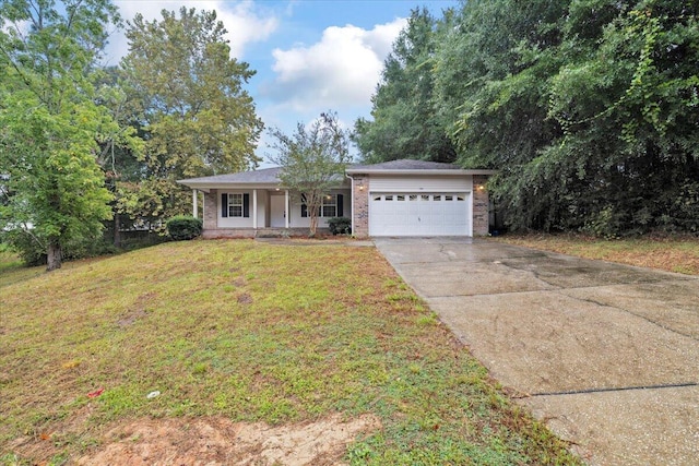 single story home featuring a garage, a porch, and a front lawn