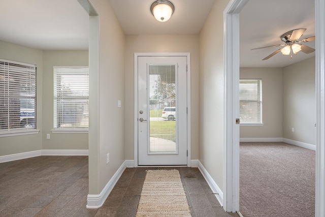 2826 Shoni Dr, Navarre, FL 32566 - doorway to outside featuring baseboards and a ceiling fan