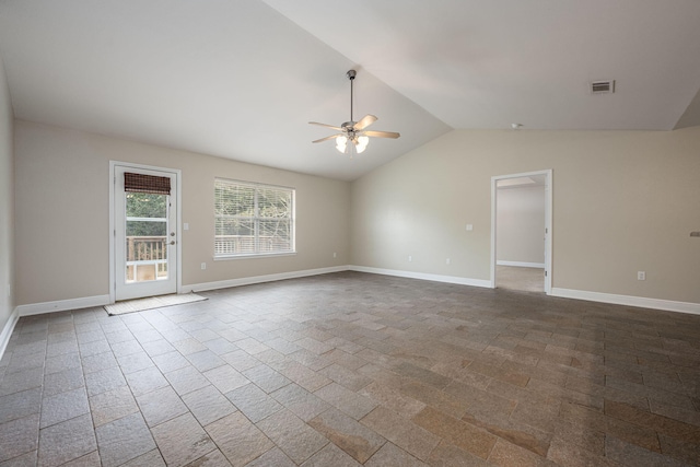 spare room with ceiling fan and vaulted ceiling