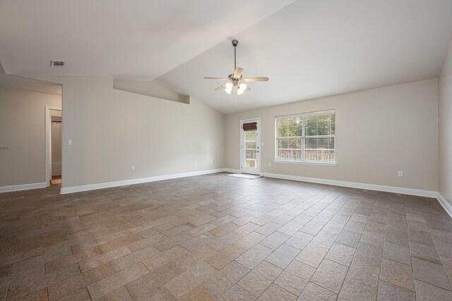 2826 Shoni Dr, Navarre, FL 32566 - spare room featuring baseboards, ceiling fan, visible vents, and lofted ceiling