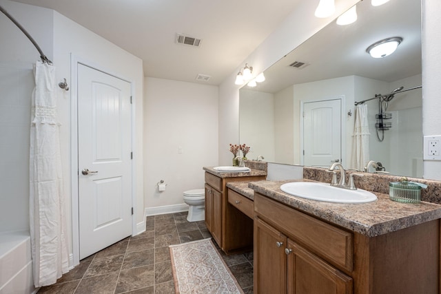 full bathroom with vanity, shower / bath combination with curtain, and toilet