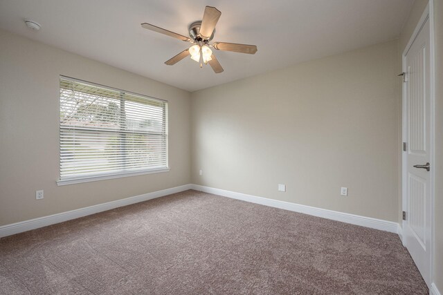 2826 Shoni Dr, Navarre, FL 32566 - carpeted empty room with ceiling fan and baseboards