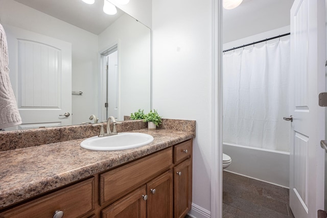 full bathroom with shower / bath combination with curtain, vanity, and toilet