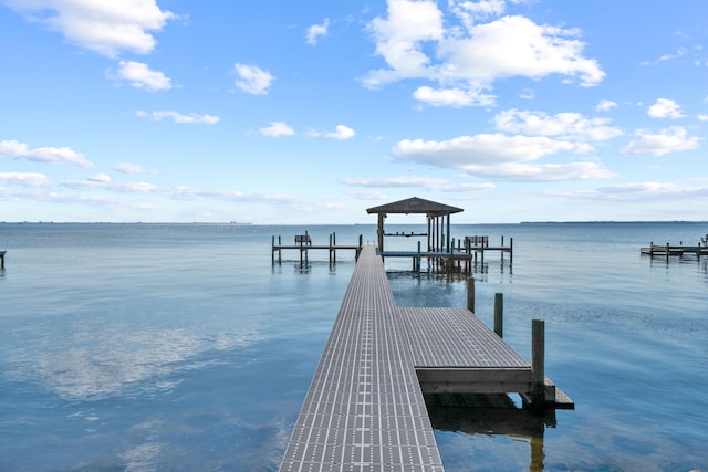 view of dock featuring a water view and boat lift