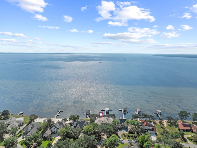 birds eye view of property with a residential view and a water view