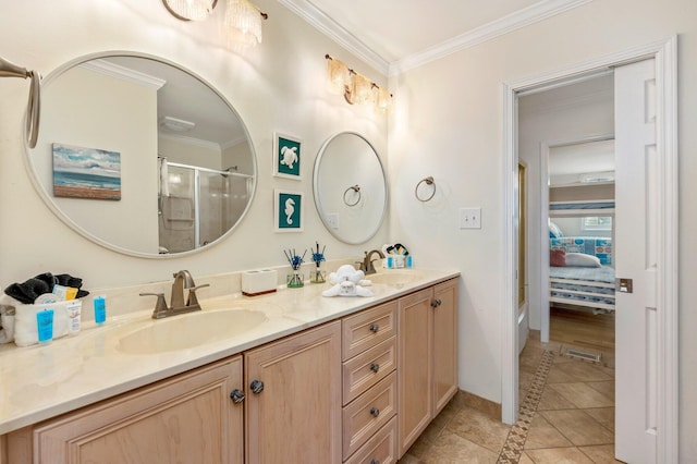 bathroom with vanity, crown molding, tile patterned floors, and an enclosed shower