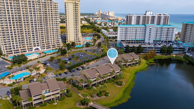 birds eye view of property featuring a water view