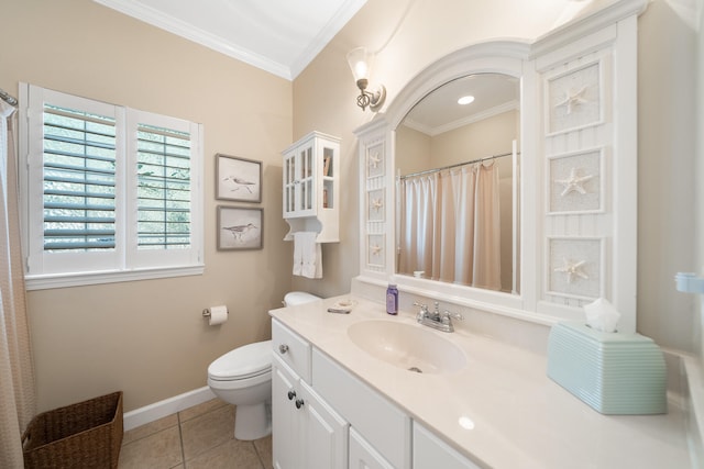 bathroom featuring tile patterned floors, vanity, toilet, and crown molding