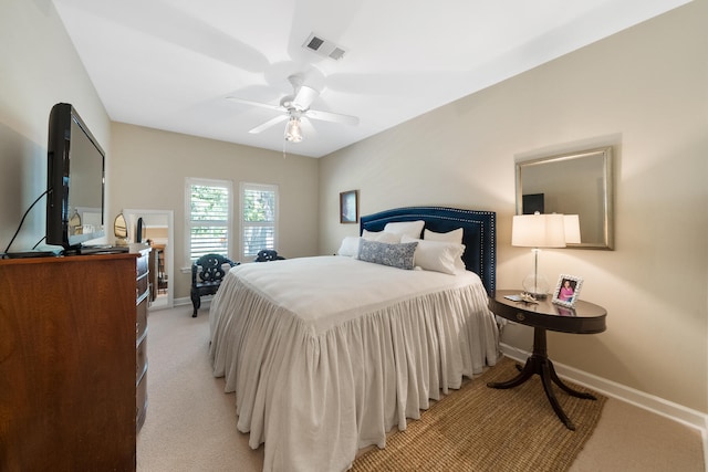 bedroom featuring ceiling fan and light colored carpet