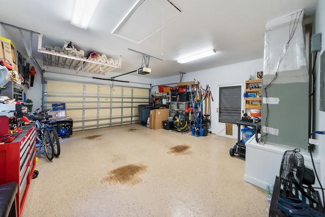 garage featuring a garage door opener