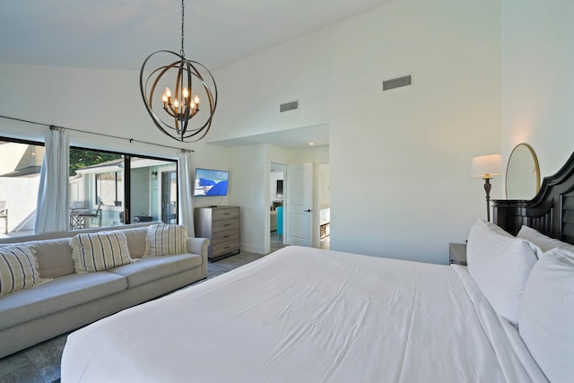 bedroom featuring an inviting chandelier, access to exterior, and high vaulted ceiling