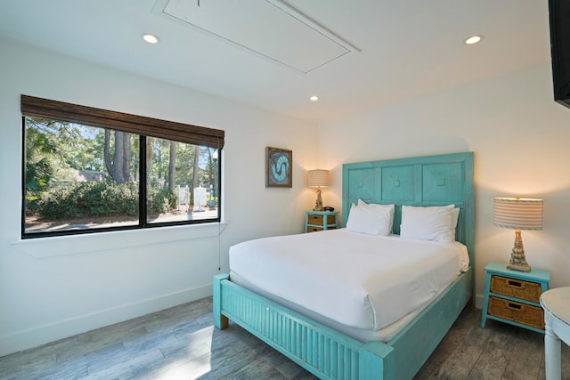 bedroom featuring dark hardwood / wood-style flooring