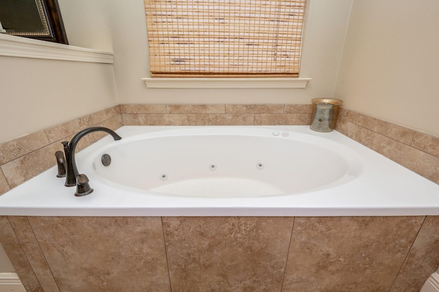 bathroom featuring a washtub