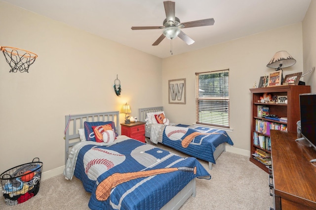 carpeted bedroom with ceiling fan