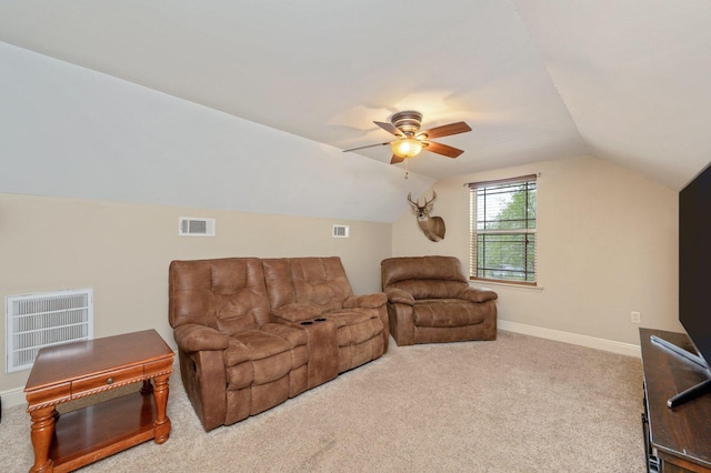 living room with ceiling fan, light colored carpet, and lofted ceiling