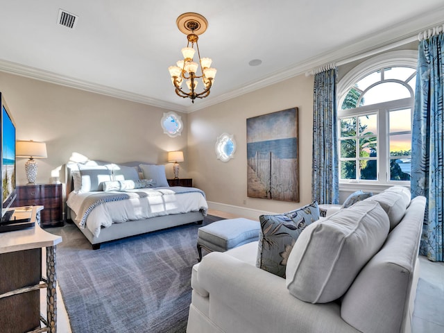 bedroom featuring crown molding and an inviting chandelier