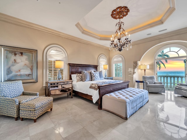 bedroom featuring a raised ceiling, an inviting chandelier, multiple windows, and ornamental molding