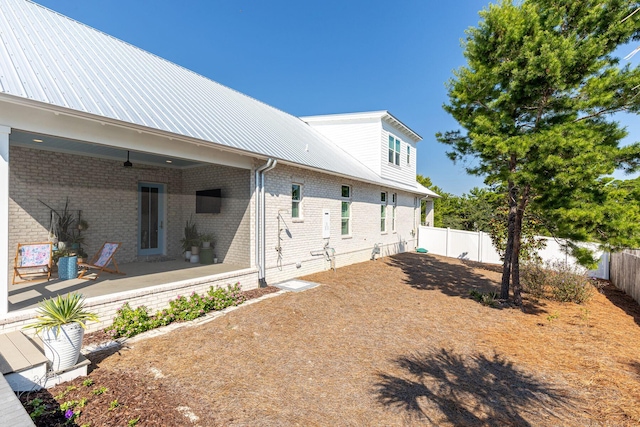 rear view of property with a patio area